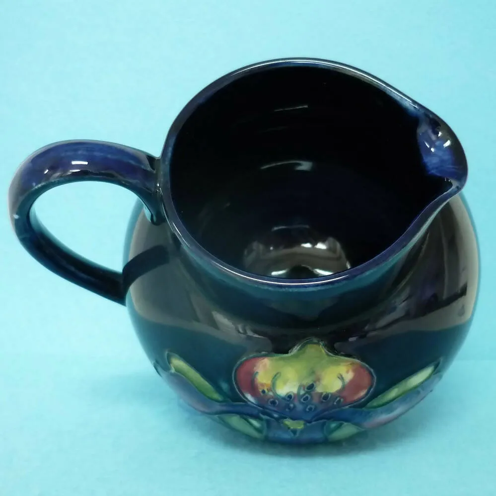 A Moorcroft (c1950's/60's) Jug in the Orchid Pattern by Walter Moorcroft