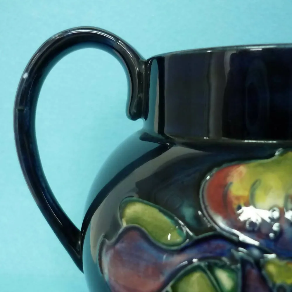 A Moorcroft (c1950's/60's) Jug in the Orchid Pattern by Walter Moorcroft