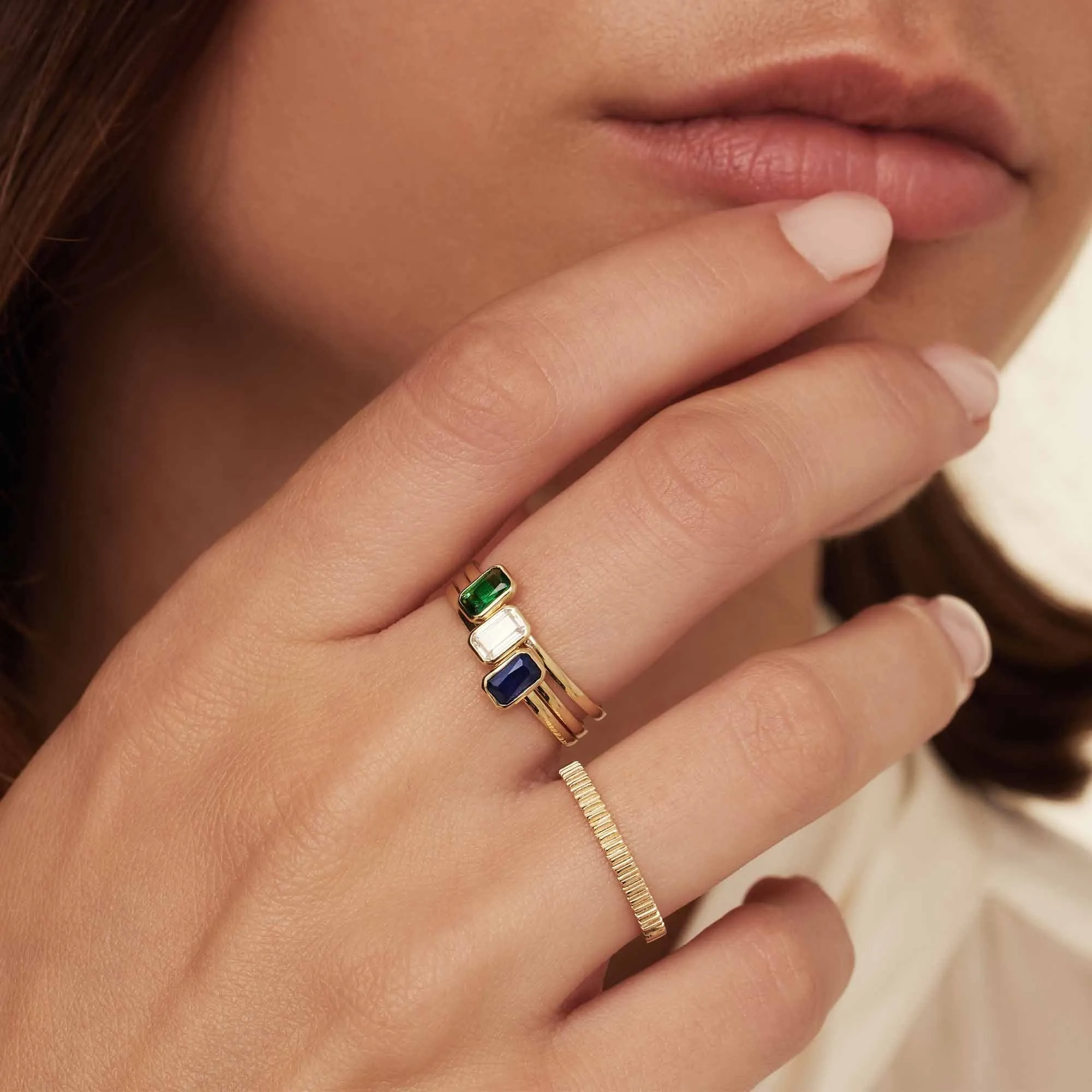 Baguette Nila 14 karat gold ring with blue zirconia