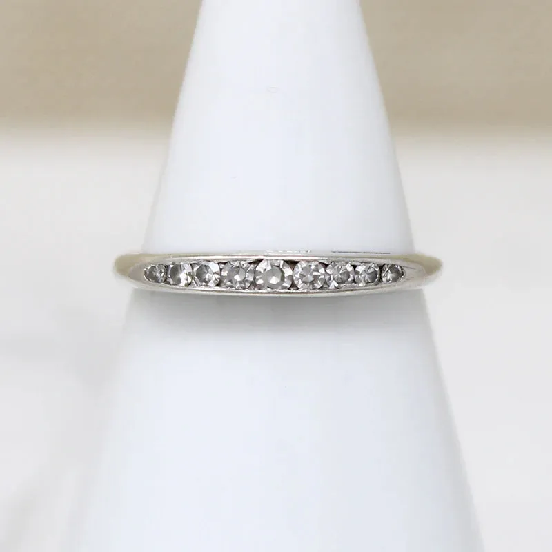 Channel Set Graduated Diamond Band in White Gold