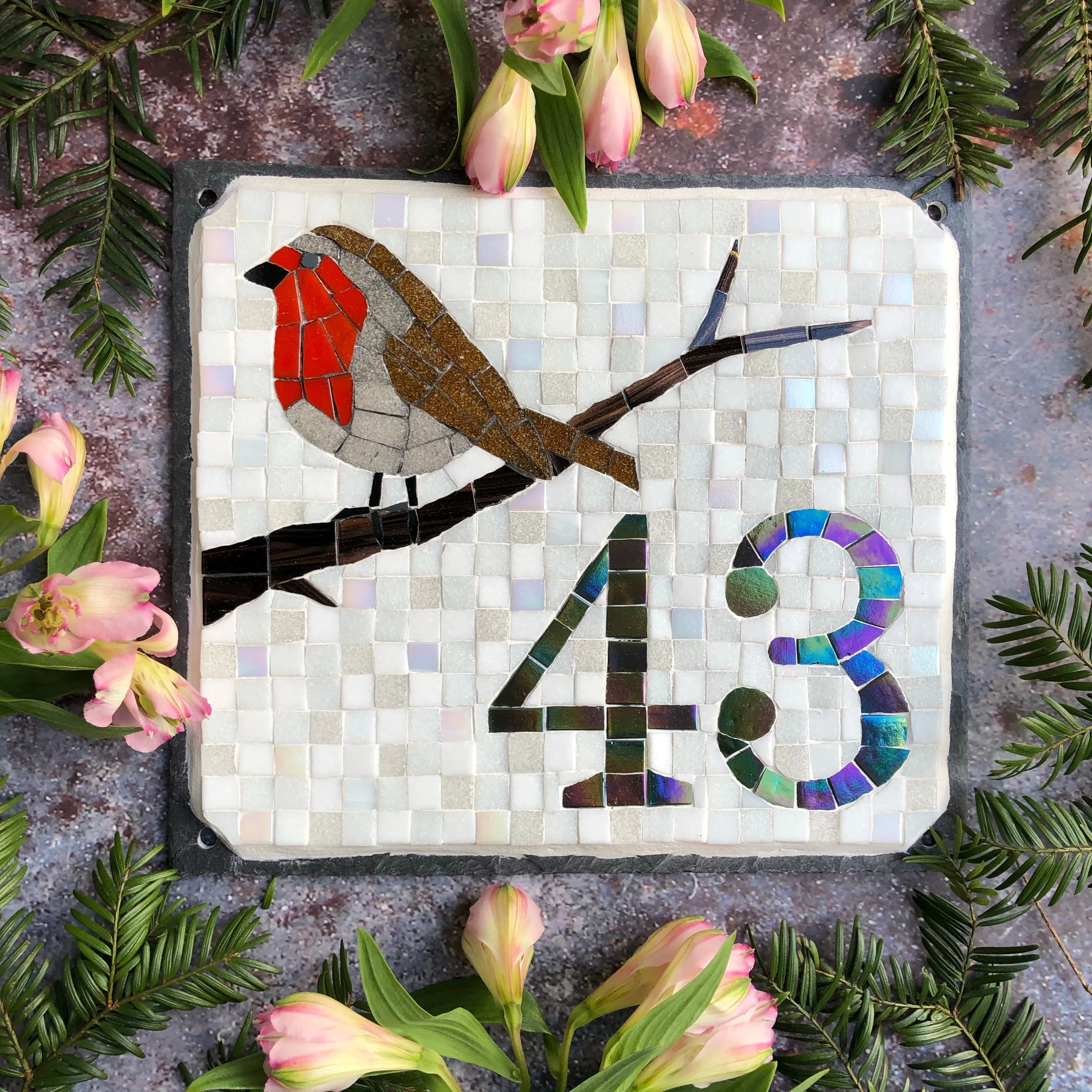 Mosaic house number with a robin