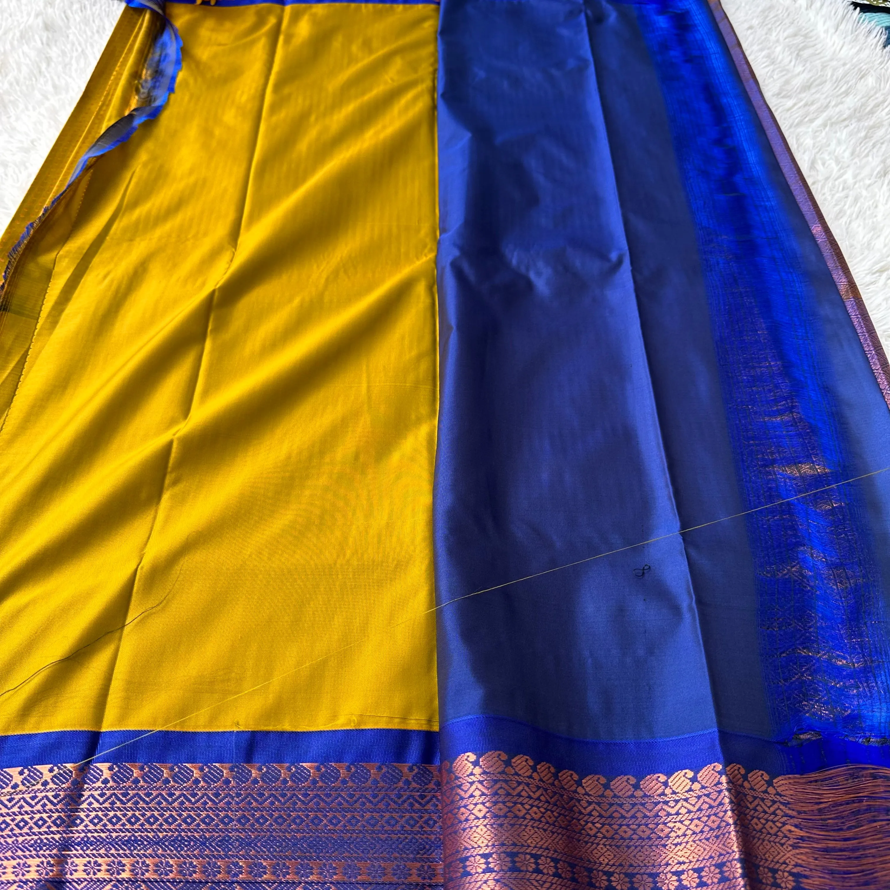 The Creamy Butterscotch Yellow Semi Silk Saree With Navy Blue Border